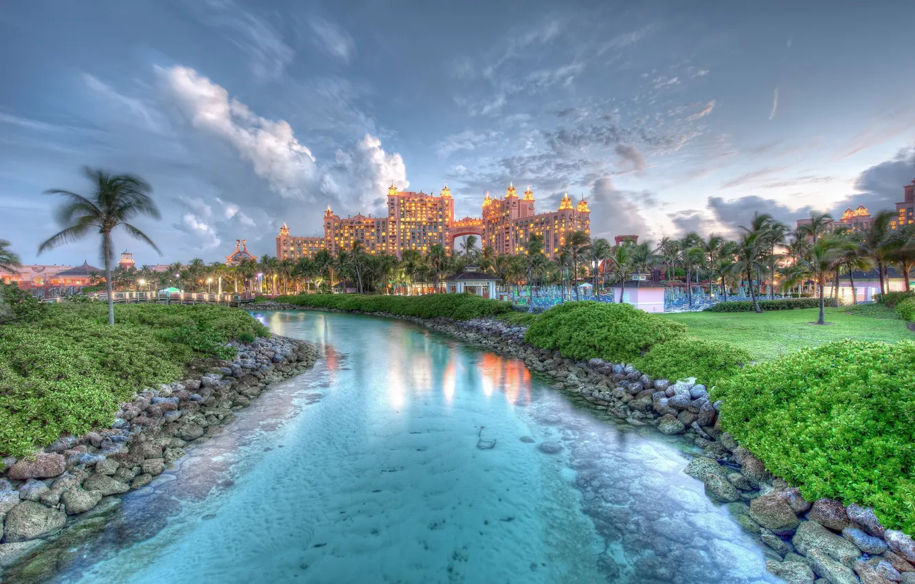 Фото обои небо, трава, вода, пейзаж, тучи, камни, пальмы, остров