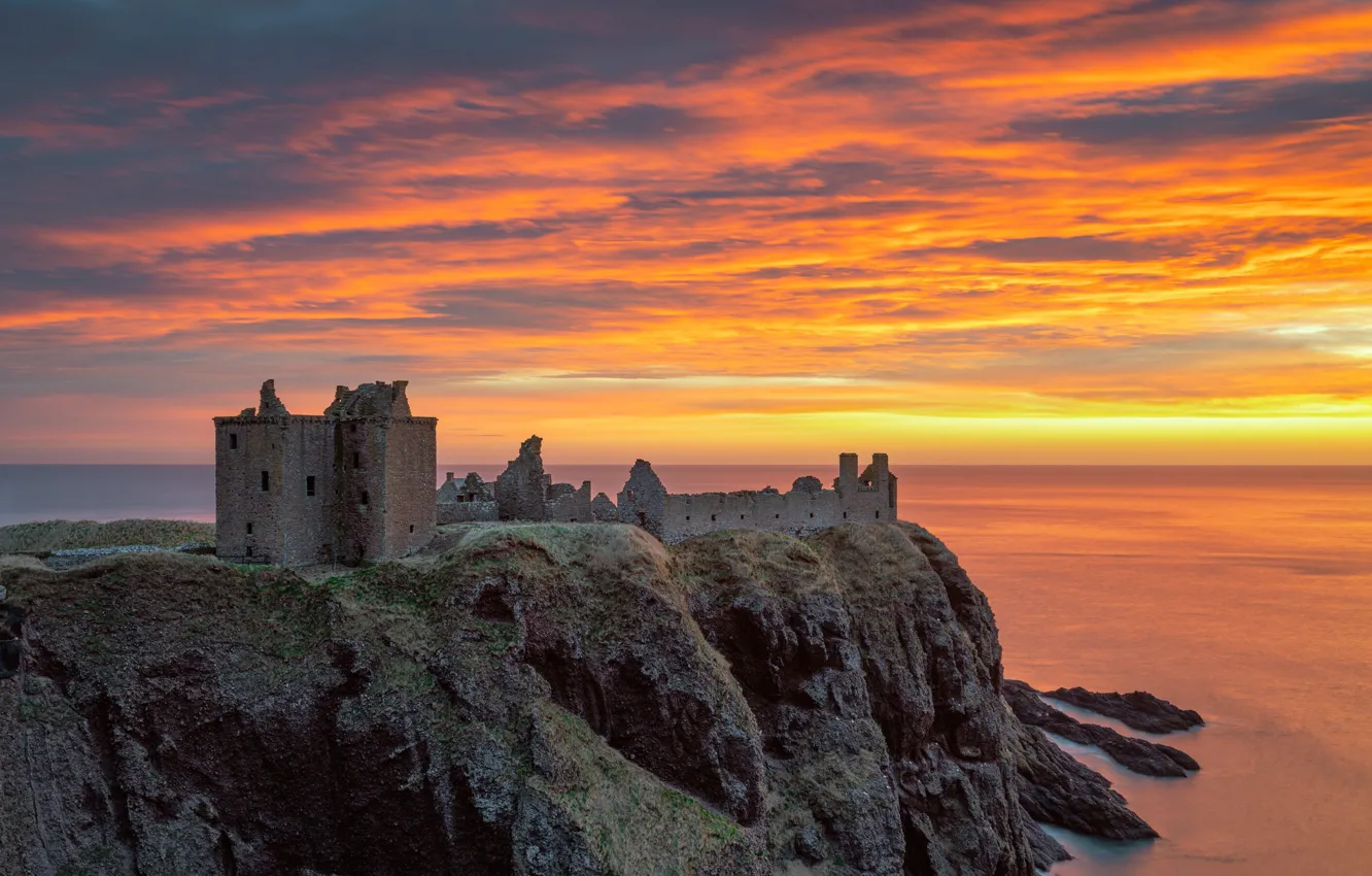 Фото обои море, небо, облака, закат, Шотландия, руины, замок Данноттар, средневековая архитектура