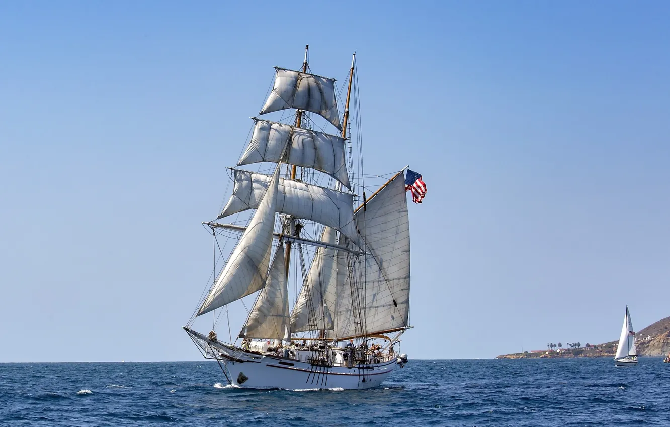 Фото обои море, корабль, парусник, флаг, паруса