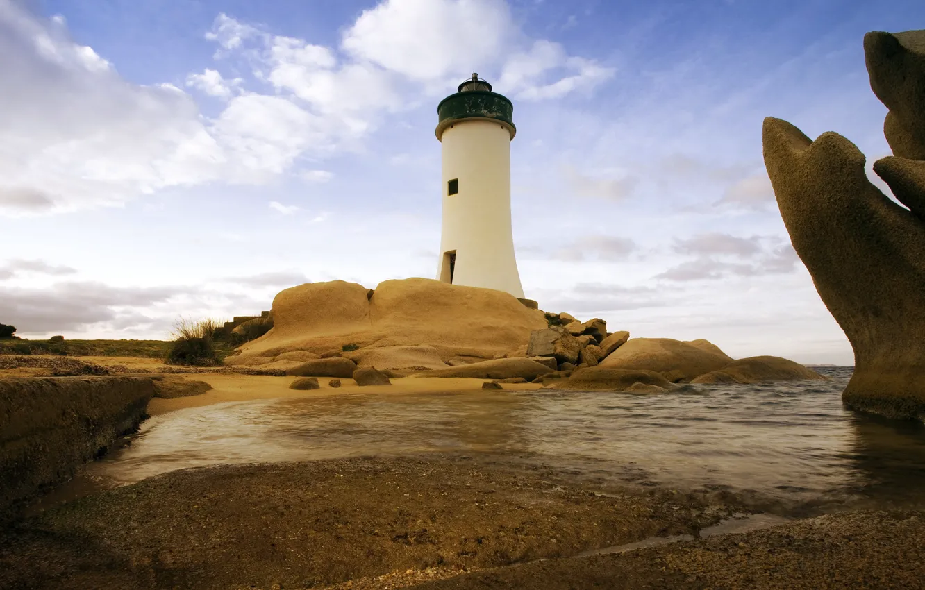 Фото обои море, небо, облака, камни, побережье, маяк, Италия, Sardinia