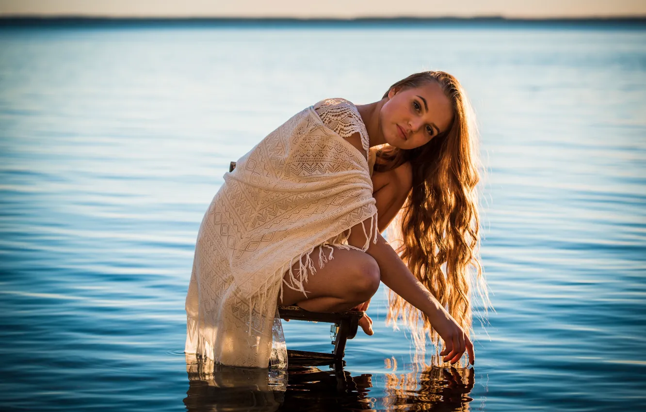 Фото обои girl, lake, chair, hair, surface, direct gaze