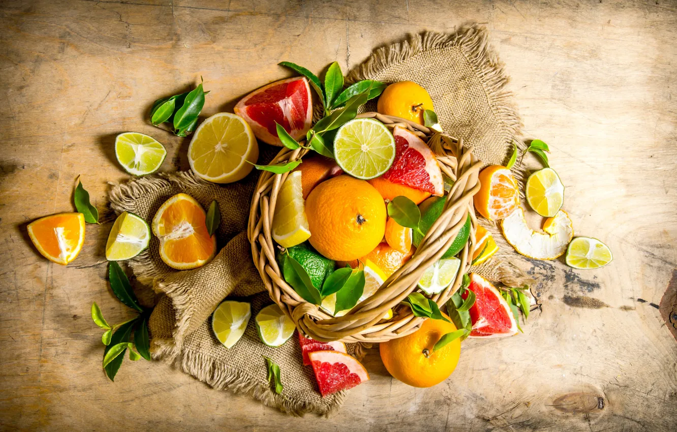 Фото обои листья, корзина, апельсины, лайм, кусочки, фрукты, цитрусы, лимоны
