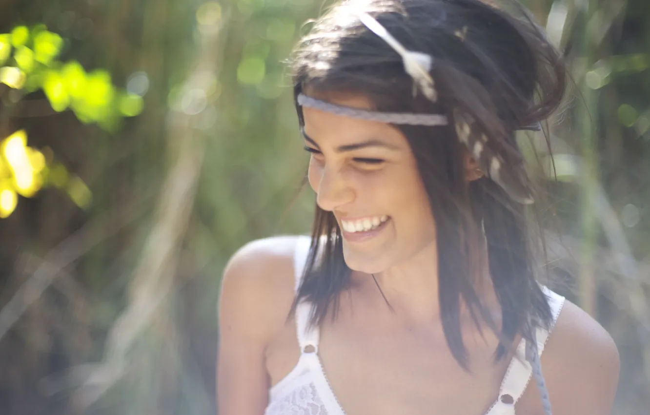 Фото обои girl, sexy, happy, laugh, feather, teeth, braid headband