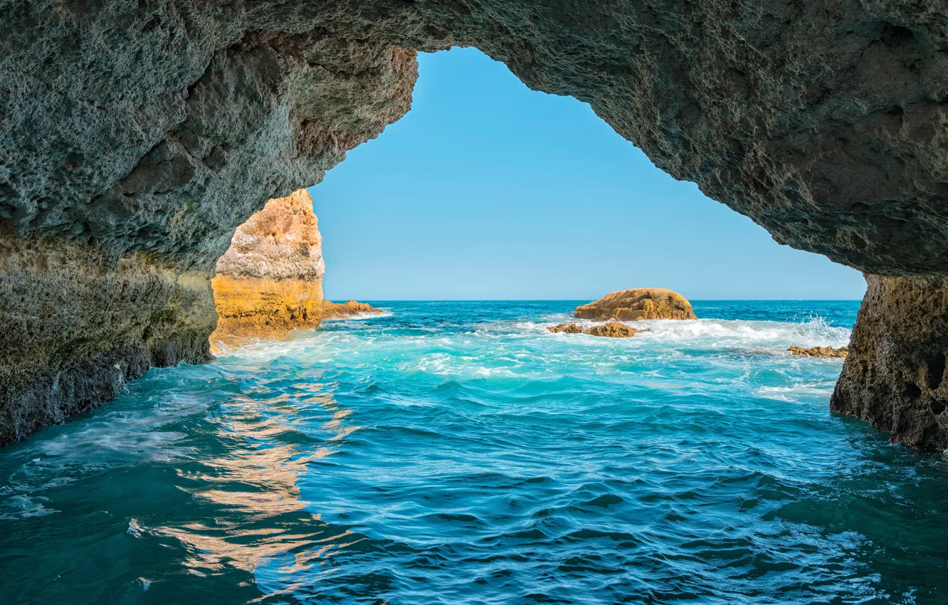 Фото обои море, небо, солнце, камни, скалы, берег, горизонт, Португалия
