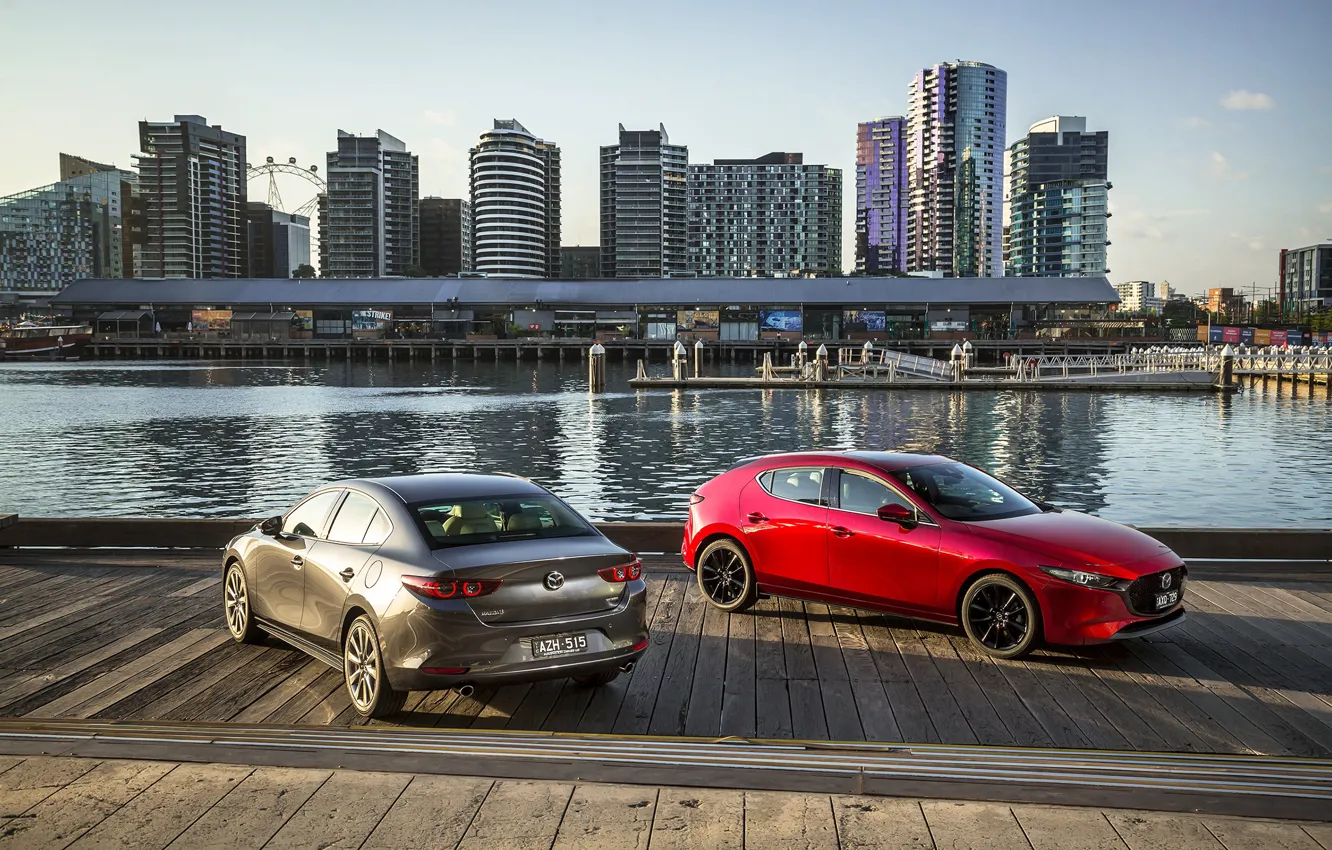 Фото обои авто, река, небоскребы, причал, Mazda