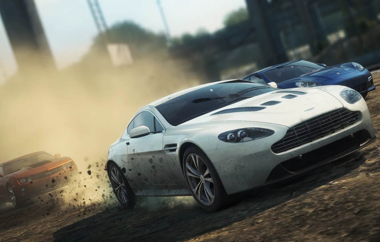 Фото обои город, гонка, пыль, need for speed most wanted 2, Aston Martin V12 Vantage, Porsche Panamera …