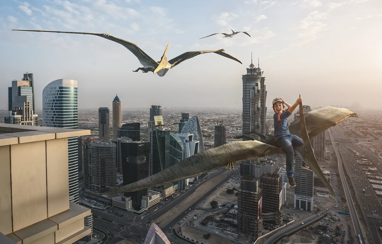 Фото обои город, ребенок, мальчик, полёт, Дубай, верхом, птеродактили