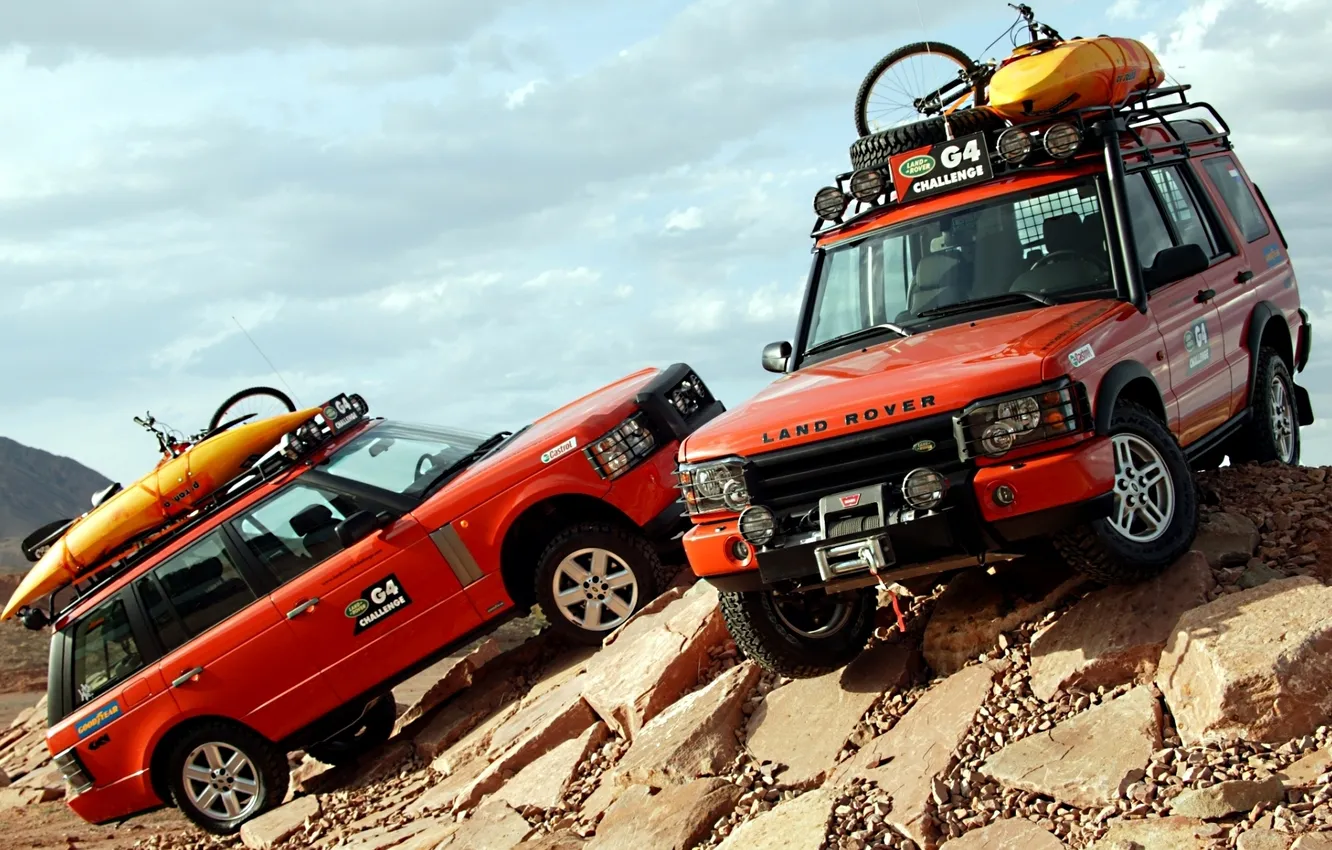 Фото обои небо, оранжевый, камни, джип, внедорожник, Land Rover, Range Rover, Discovery