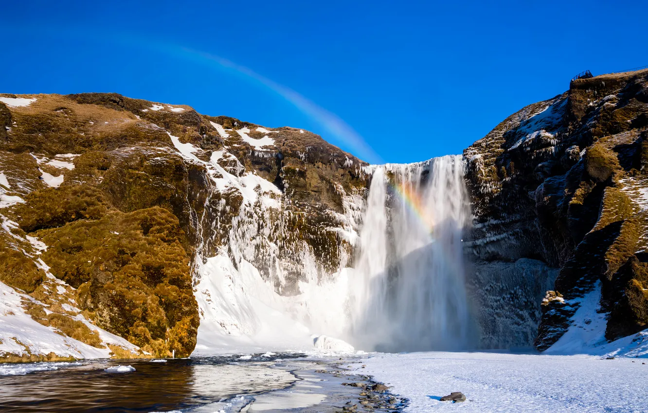 Фото обои зима, снег, горы, скалы, водопад, радуга