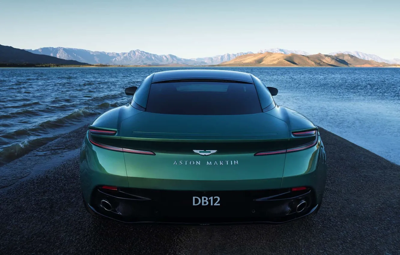 Фото обои облака, горы, Aston Martin, вид сзади, спортивное купе, 2023, sports coupe, Aston Martin DB12