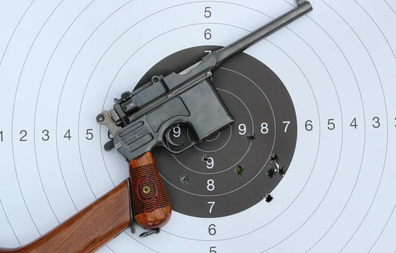 Фото обои metal, gun, pistol, wood, bullet, performance, target, holes.