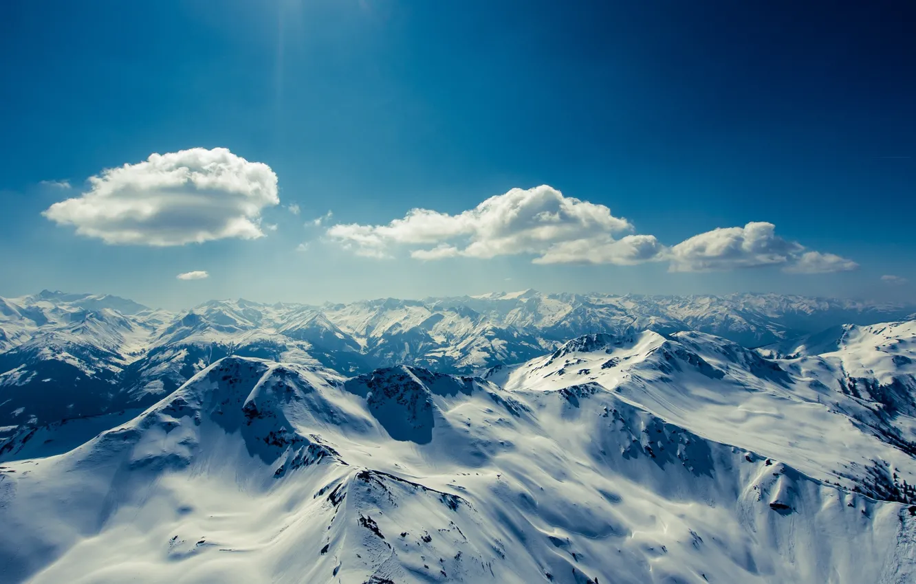 Фото обои зима, небо, облака, снег, горы, горизонт, солнечный
