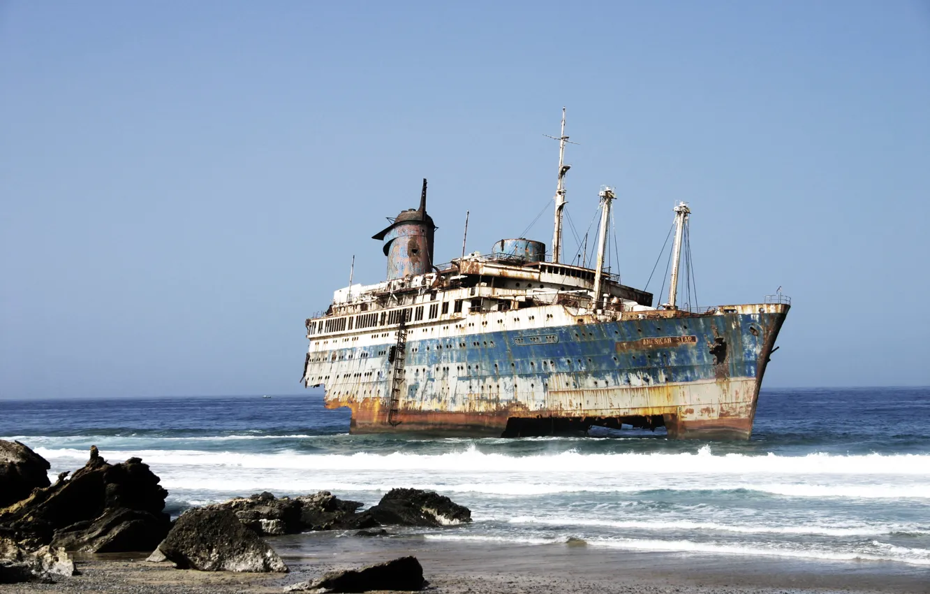 Фото обои sea, stones, shore, ghost. ship